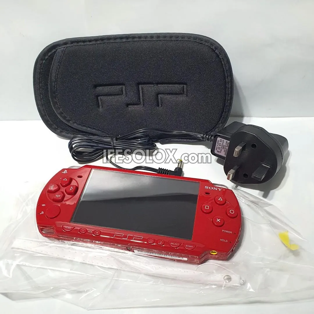 PlayStation Portable PSP 2000 series Game Console with 16GB Memory Stick and 15 Games (Red) - Foreign Used